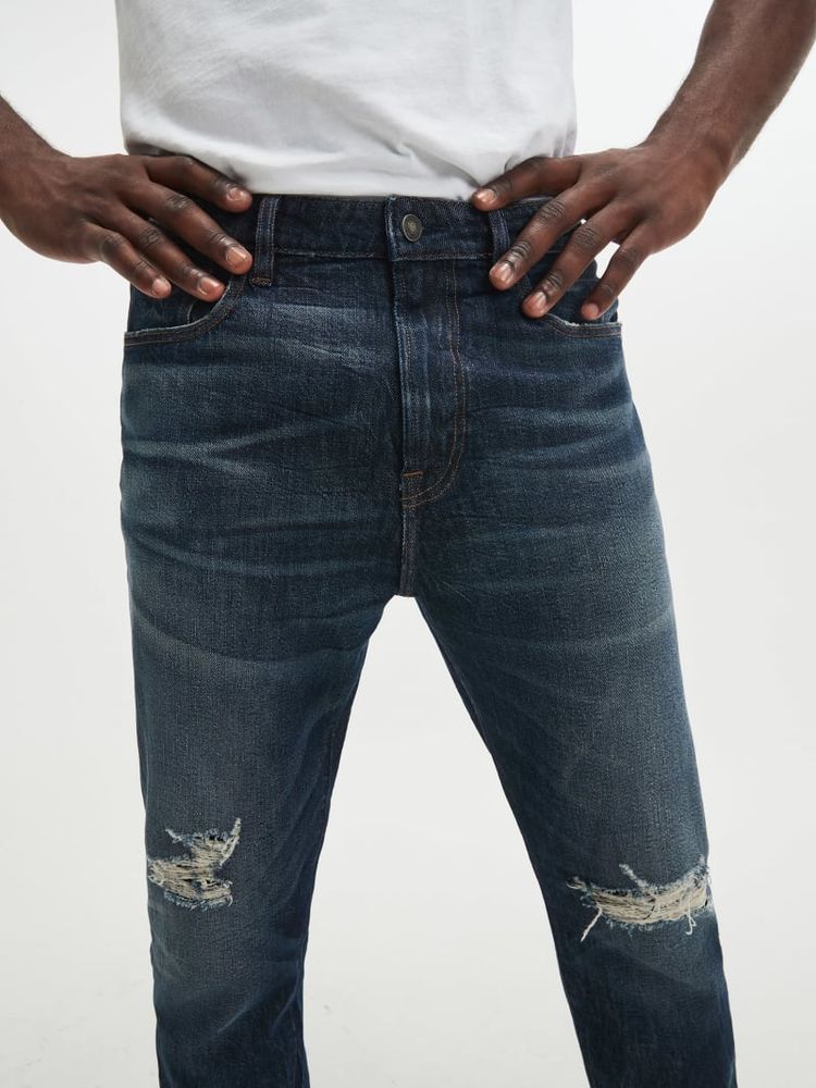 Distressed Relaxed Tapered Jeans