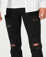 Ripped Light Wash Stacked Skinny Jeans