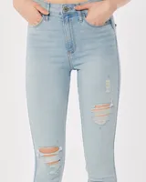 Ultra High-Rise Ripped Light Wash Super Skinny Jeans