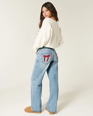 Low-Rise Light-Wash Bow Graphic Baggy Jeans