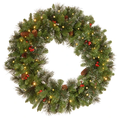 30" Crestwood® Spruce Wreath with Pine Cones, Red Berries, Glitter & Clear Lights
