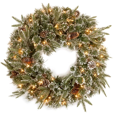 24" Feel Real® Liberty Pine Wreath with Snow, Pine Cones & Clear Lights