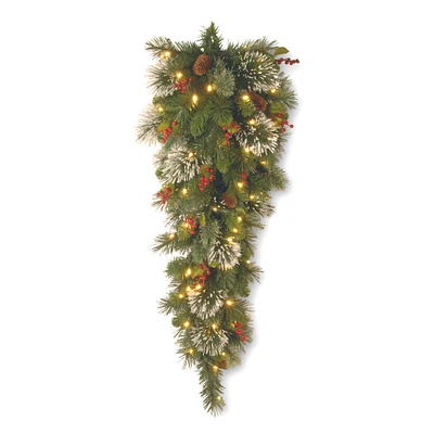 3ft. Wintry Pine® Cones, Red Berries & Snowflakes Slim Teardrop Swag With Warm White LED Lights