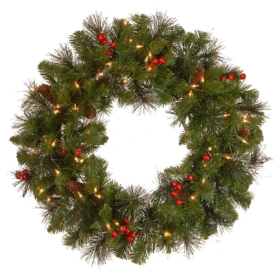 24" Crestwood® Spruce Wreath with Silver Bristle, Pine Cones, Red Berries & Glitter with Clear Lights