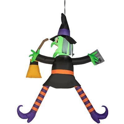 5ft. Airblown® Inflatable Halloween Crashing Witch with Spell Book