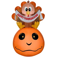 5ft. Airblown® Inflatable Harvest Turkey & Pumpkin with Banner Scene