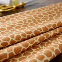 Fabric Traditions Jungle Babies Golden Brown Giraffe Spots Cotton Fabric
