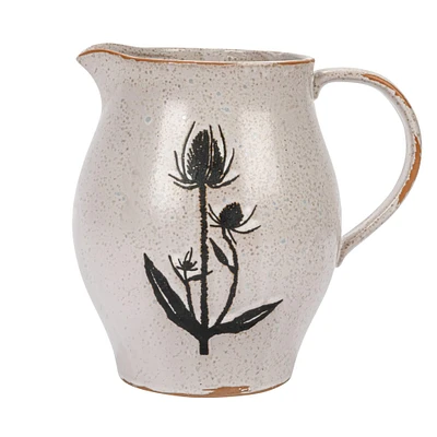 50oz. White & Black Reactive Glaze Flower Design Debossed Stoneware Pitcher