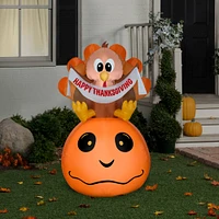 5ft. Airblown® Inflatable Harvest Turkey & Pumpkin with Banner Scene