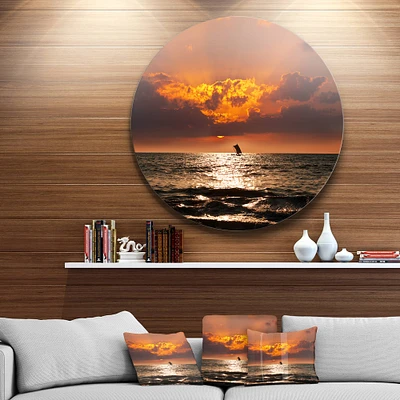 Designart - Sunset Beach with Distant Sail Boat' Seashore Oversized Metal Circle Wall Art