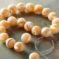 12 Pack: Natural Mother of Pearl Round Beads, 8mm Bead Landing™
