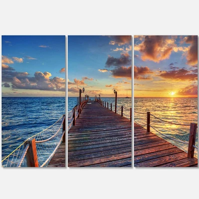 Designart - Beautiful Sunset over Sea Pier