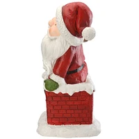 14" Santa Climbing Into Chimney Figurine