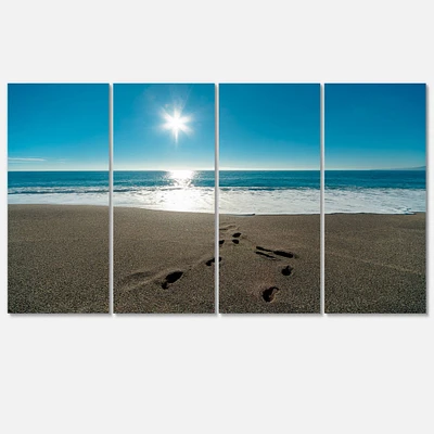 Designart - Blue Sea and Footprints in Sand