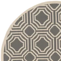 Safavieh Courtyard Collection Torma Geometric Indoor/Outdoor Round Area Rug