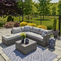 Signature Design by Ashley® Petal Road 4-pc. Outdoor Loveseat Sectional Ottoman Table Set
