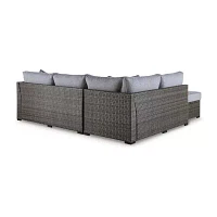 Signature Design by Ashley® Petal Road 4-pc. Outdoor Loveseat Sectional Ottoman Table Set
