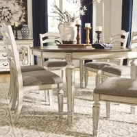 Signature Design by Ashley Realyn 7-Piece Oval Extension Ladderback Dining Set