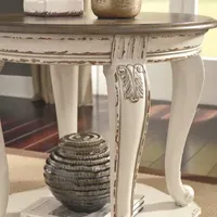 Signature Design by Ashley Realyn 26" Round End Table