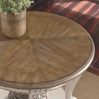 Signature Design by Ashley Realyn 26" Round End Table