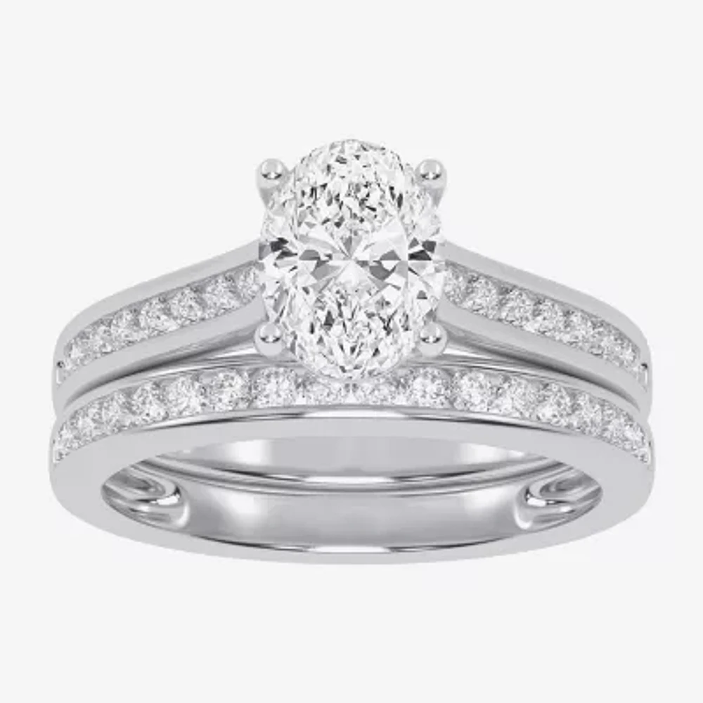 (G / Vs2 Si1) Womens 1 1/2 CT. T.W. Lab Grown White Diamond 10K Gold Oval Side Stone Bridal Set