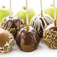 Nostalgia Lazy Susan Chocolate & Caramel Apple Party with Heated Fondue Pot, 25 Sticks, Decorating and Toppings Trays