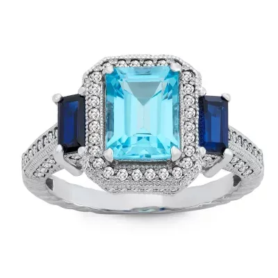 Womens Genuine Blue Topaz Sterling Silver Side Stone Cocktail Ring