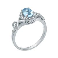 1/4 CT. T.W. Diamond and Genuine Aquamarine 10K White Gold Ring