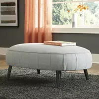 Signature Design by Ashley® Hollyann Living Room Collection Upholstered Ottoman