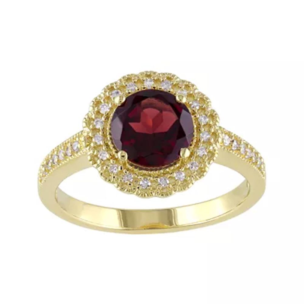 Genuine Garnet and 1/7 CT. T.W. Diamond Ring