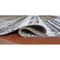 Signature Design by Ashley� Devman Washable Indoor Rectangular Area Rug