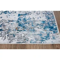 Signature Design by Ashley� Garyard Washable Indoor Rectangular Area Rug