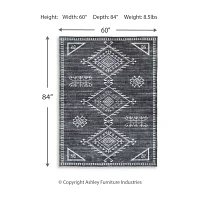 Signature Design by Ashley� Arloman Washable Indoor Rectangular Area Rug