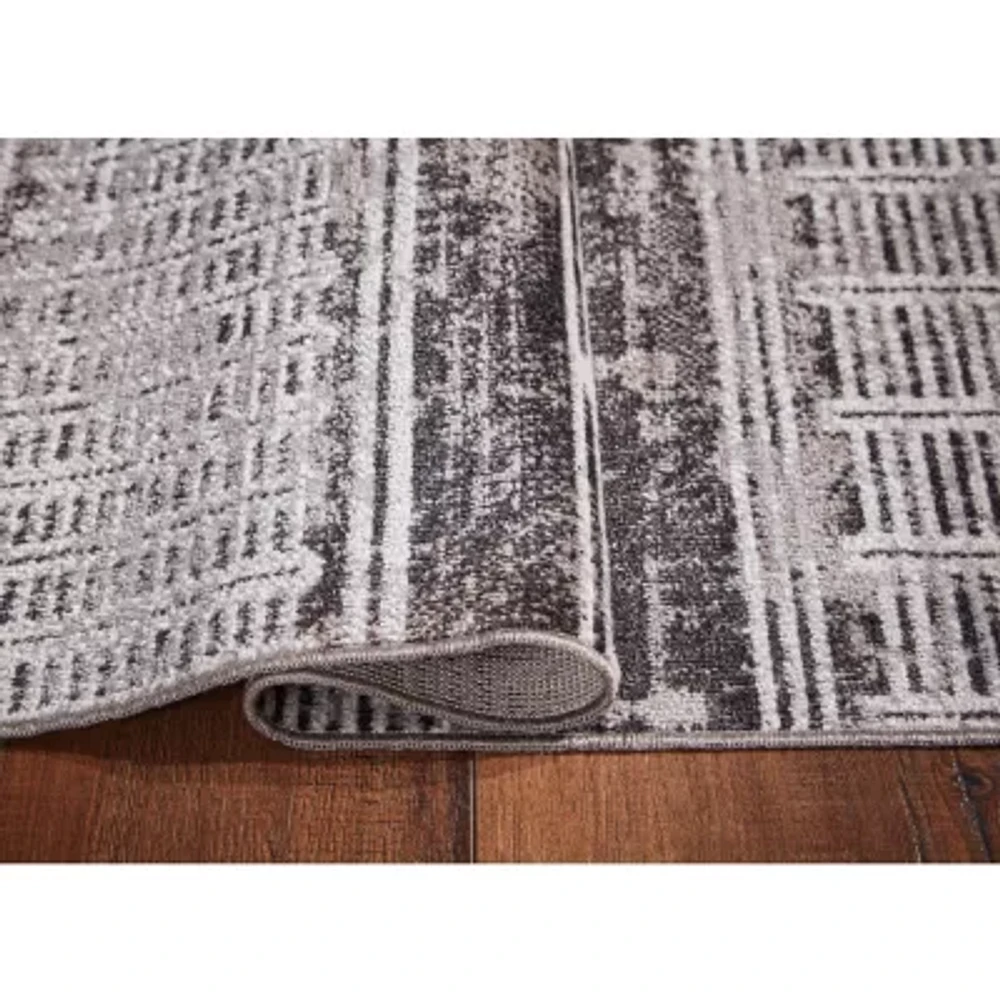 Signature Design by Ashley® Henchester Washable Indoor Rectangular Area Rug