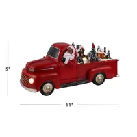 African American Santa In Red Truck Animated Figurine