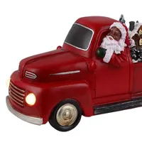 African American Santa In Red Truck Animated Figurine