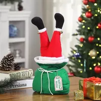 Mini Kicker Santa In Bag Animated Christmas Tabletop Decor