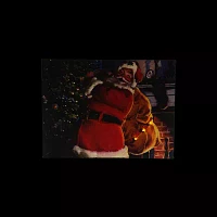 LED Lighted Jolly Santa Claus with Bag of Gifts Christmas Canvas Wall Art 11.75" x 15.75"