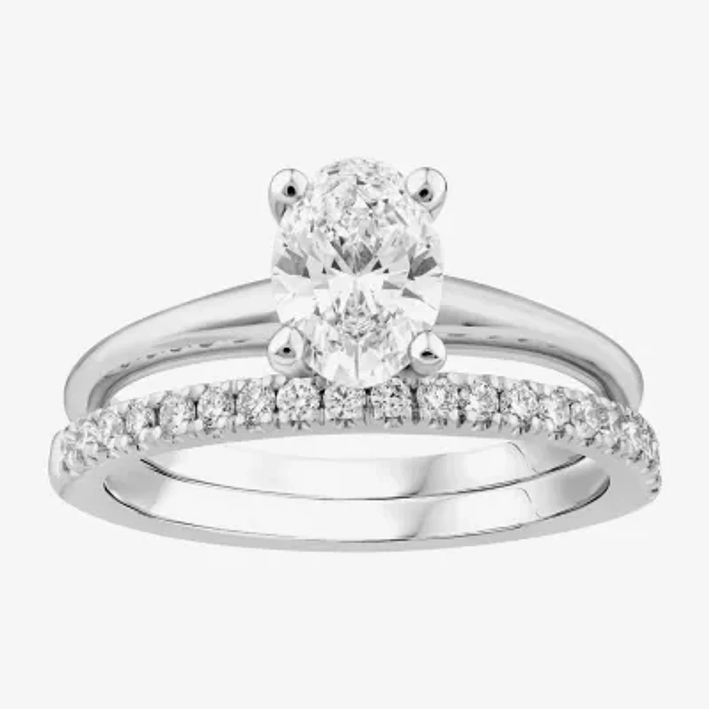 1 1/4 CT. T.W. Oval Lab-Grown (H / SI2) Diamond Solitaire Bridal Set 10K or 14K Gold