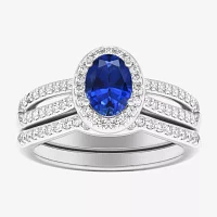 Modern Bride Gemstone Womens / CT. T.W. Genuine Blue Sapphire 10K Gold Oval Side Stone Halo Engagement Ring