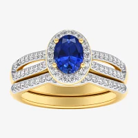 Modern Bride Gemstone Womens / CT. T.W. Genuine Blue Sapphire 10K Gold Oval Side Stone Halo Engagement Ring