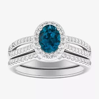 Modern Bride Gemstone Womens / CT. T.W. Genuine Blue Topaz 10K Gold Oval Side Stone Halo Engagement Ring