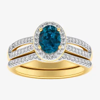 Modern Bride Gemstone Womens / CT. T.W. Genuine Blue Topaz 10K Gold Oval Side Stone Halo Engagement Ring