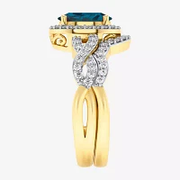 Modern Bride Gemstone Womens 1/2 CT. T.W. Genuine Blue Topaz 10K Gold Oval Side Stone Crossover Engagement Ring