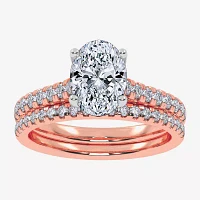 (H-I / Si2-I1) Womens 1 1/2 CT. T.W. Lab Grown White Diamond 10K or 14K Gold Oval Side Stone Bridal Set