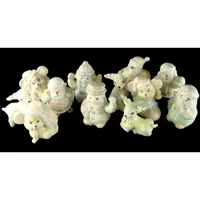 Club Pack of 144 Pastel and Ivory Snowman and Santa Claus Christmas Figurines 3"