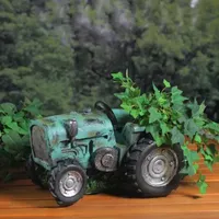 12.25'' Green and Black Distressed Tractor Garden Patio Planter