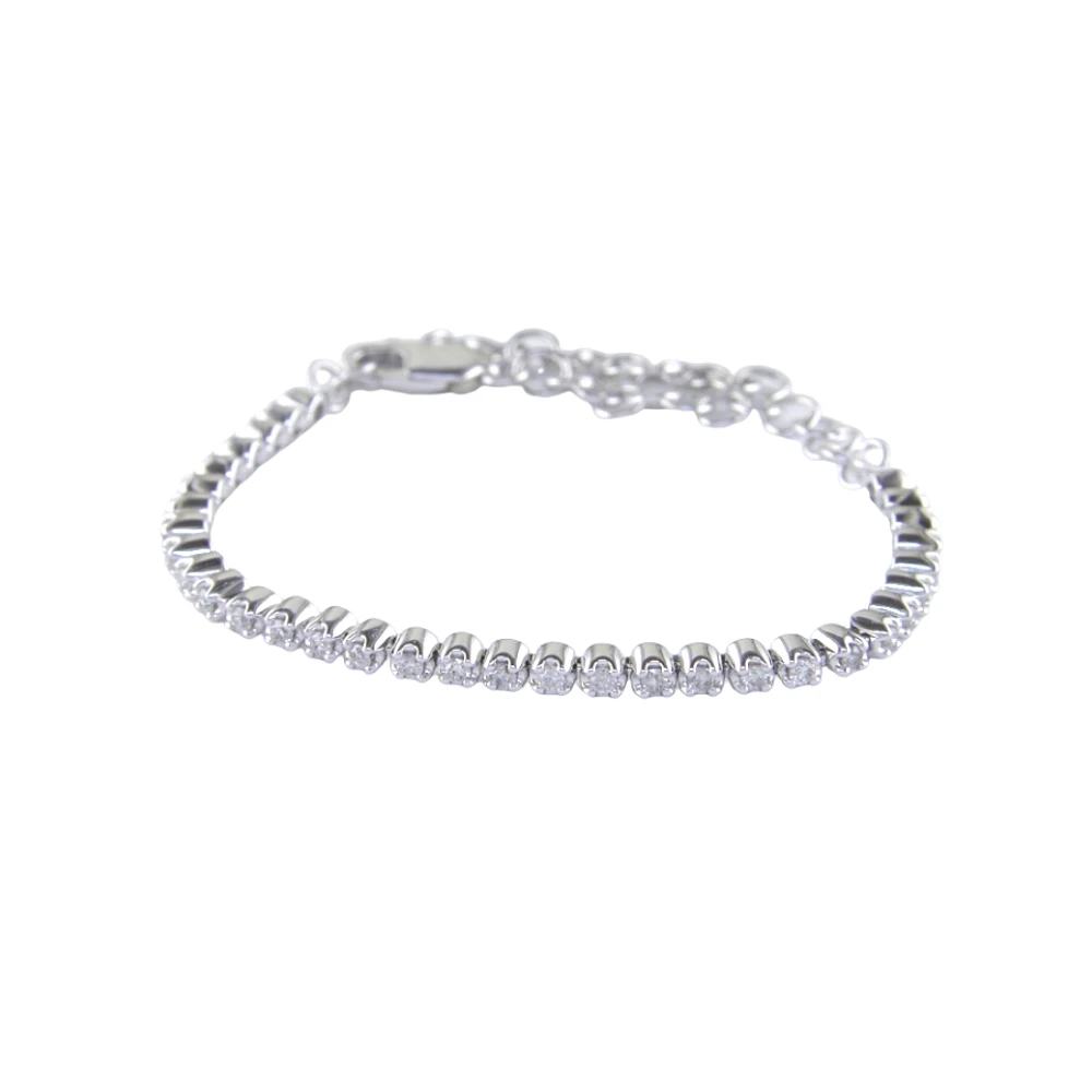 10K WHITE GOLD TENNIS BRACELET.