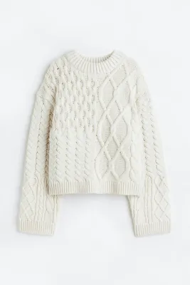 Suéter en tejido trenzado