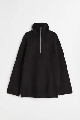 Pull zippé en maille côtelée